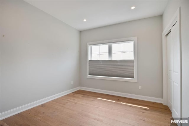 133 Graham Ter, Saddle Brook, NJ 07663 - unfurnished bedroom featuring light wood-type flooring, recessed lighting, and a closet