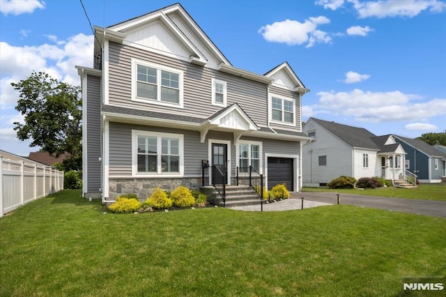 133 Graham Ter, Saddle Brook, NJ 07663 - view of front of property with asphalt driveway, an attached garage, stone siding, and board and batten siding