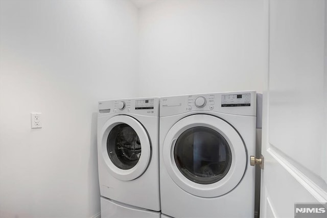 133 Graham Ter, Saddle Brook, NJ 07663 - washroom featuring washing machine and dryer