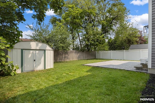 133 Graham Ter, Saddle Brook, NJ 07663 - fenced backyard featuring a storage unit and a patio area