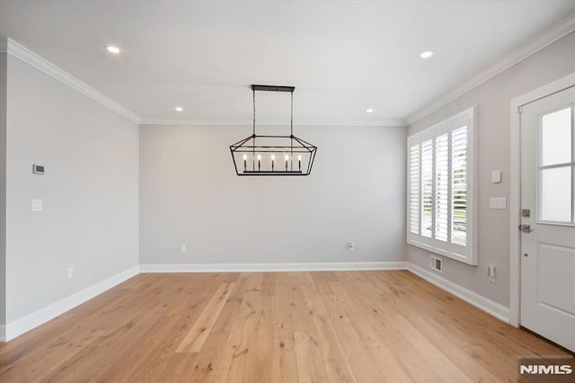 133 Graham Ter, Saddle Brook, NJ 07663 - unfurnished dining area with light wood-type flooring, crown molding, recessed lighting, and a chandelier