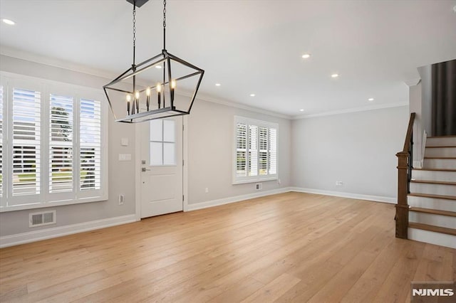 133 Graham Ter, Saddle Brook, NJ 07663 - entrance foyer with light wood-type flooring, crown molding, stairway, a chandelier, and recessed lighting