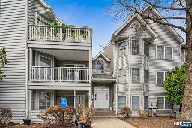 94 Quartz Ln, Paterson, NJ 07501 - view of front facade with a balcony