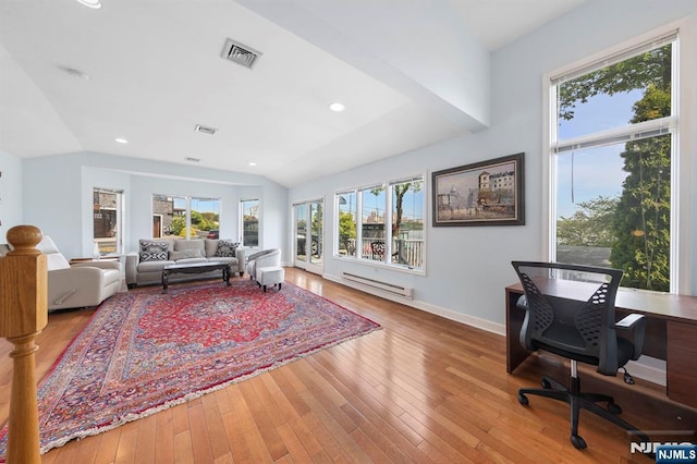 4 Colony Rd, Edgewater, NJ 07020 - living room with hardwood / wood-style floors, visible vents, baseboards, baseboard heating, and vaulted ceiling