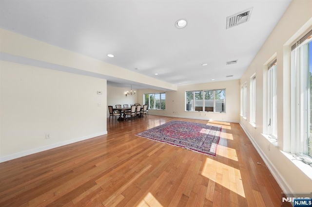 4 Colony Rd, Edgewater, NJ 07020 - living room with a chandelier, light wood-style floors, visible vents, and recessed lighting