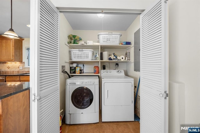 4 Colony Rd, Edgewater, NJ 07020 - clothes washing area featuring laundry area, light tile patterned floors, and washing machine and clothes dryer
