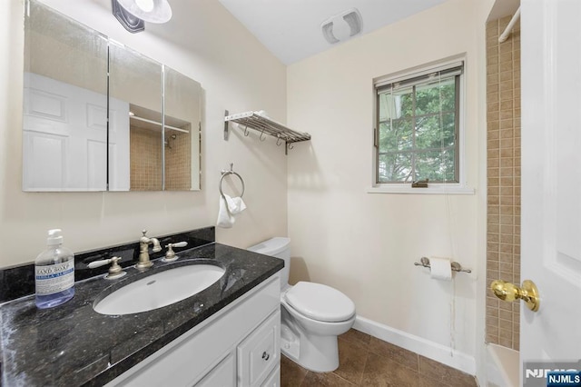 4 Colony Rd, Edgewater, NJ 07020 - full bathroom with vanity, toilet, baseboards, and tile patterned floors