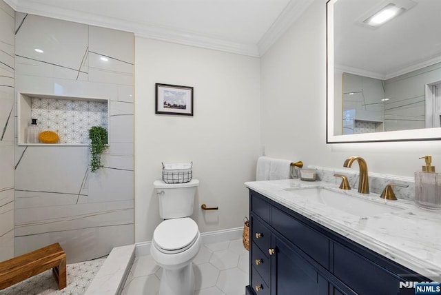 full bathroom with crown molding, vanity, baseboards, a tile shower, and toilet