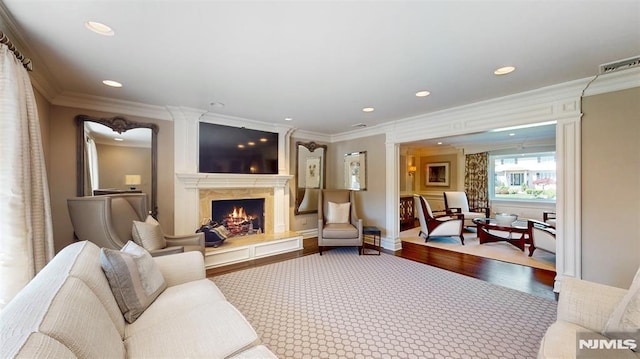 19 Merrill Dr, Mahwah, NJ 07430 - living area featuring a fireplace, ornamental molding, recessed lighting, and wood finished floors