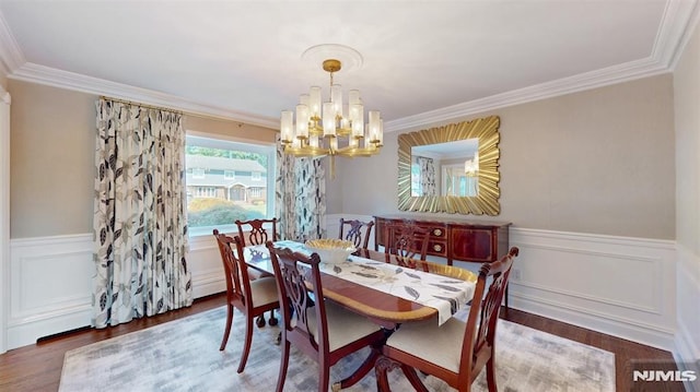 19 Merrill Dr, Mahwah, NJ 07430 - dining room with a chandelier, wainscoting, ornamental molding, and wood finished floors