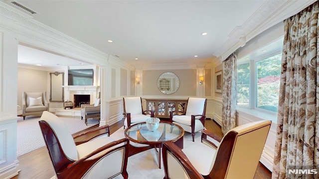 19 Merrill Dr, Mahwah, NJ 07430 - dining area featuring a decorative wall, wood finished floors, ornamental molding, a fireplace, and recessed lighting
