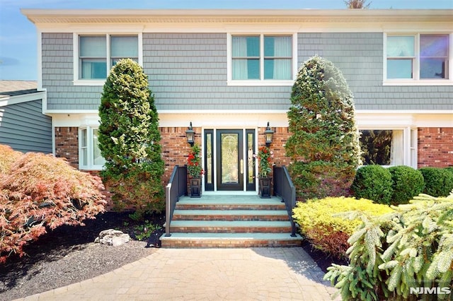 19 Merrill Dr, Mahwah, NJ 07430 - view of front of home with brick siding