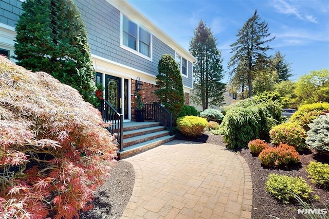 19 Merrill Dr, Mahwah, NJ 07430 - view of exterior entry with a patio area