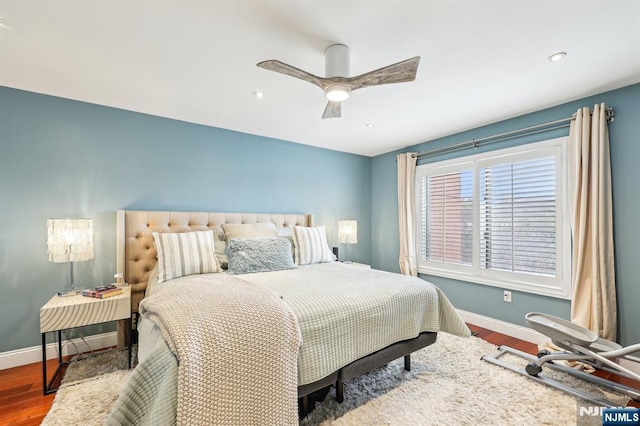 bedroom featuring baseboards, ceiling fan, recessed lighting, and wood finished floors
