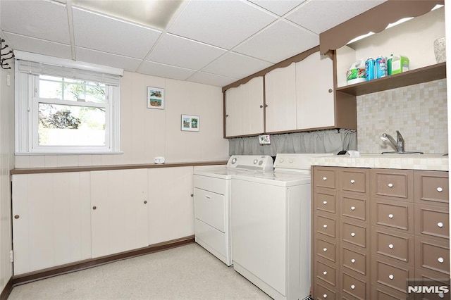 laundry room with cabinet space and independent washer and dryer
