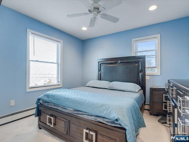 bedroom featuring a baseboard radiator, a baseboard heating unit, ceiling fan, light colored carpet, and recessed lighting