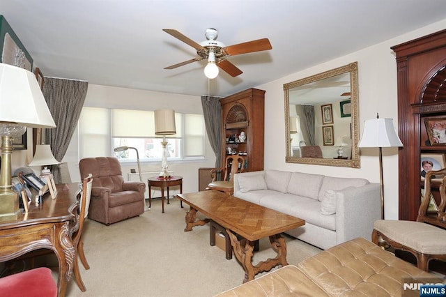 311 Grand Ave Unit 23, Englewood, NJ 07631 - living room featuring ceiling fan and light colored carpet