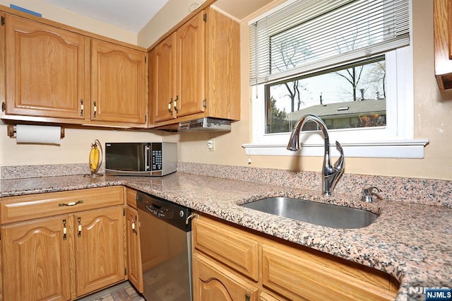 311 Grand Ave Unit 23, Englewood, NJ 07631 - kitchen featuring light stone counters, appliances with stainless steel finishes, and a sink