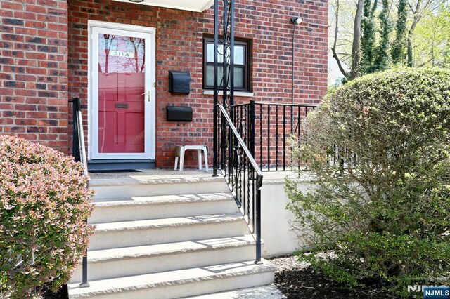 311 Grand Ave Unit 23, Englewood, NJ 07631 - view of exterior entry with brick siding