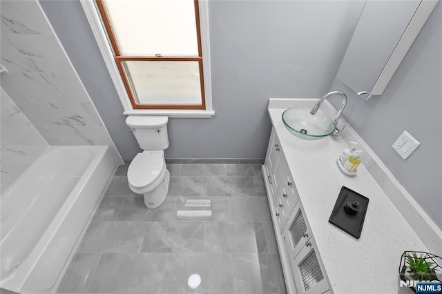 85 Anderson Ave, Wallington, NJ 07057 - full bath featuring vanity, baseboards, toilet, a tub to relax in, and a shower