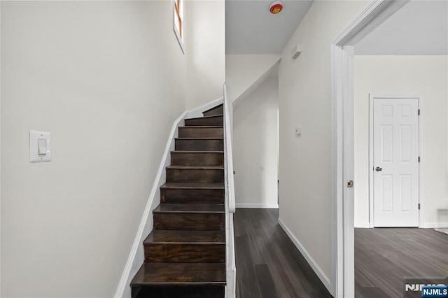 85 Anderson Ave, Wallington, NJ 07057 - stairs featuring wood finished floors and baseboards