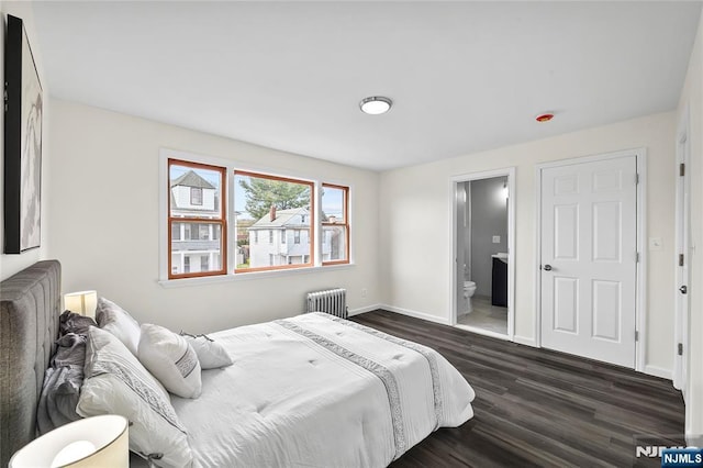 85 Anderson Ave, Wallington, NJ 07057 - bedroom featuring radiator, dark wood-style flooring, baseboards, and connected bathroom