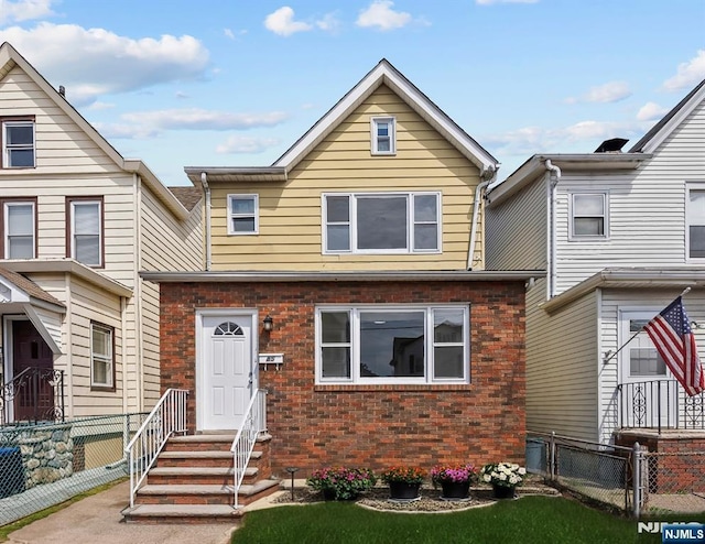 85 Anderson Ave, Wallington, NJ 07057 - view of front of house with brick siding and entry steps