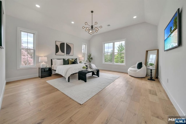 bedroom with vaulted ceiling, light wood-style floors, an inviting chandelier, baseboards, and recessed lighting