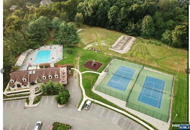 44 Southerland Dr, Mahwah, NJ 07430 - aerial view of property's location featuring a pool and a forest