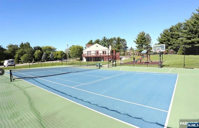 44 Southerland Dr, Mahwah, NJ 07430 - view of tennis court featuring community basketball court