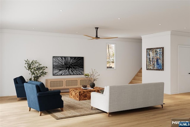 living area featuring a ceiling fan, recessed lighting, and light wood-type flooring