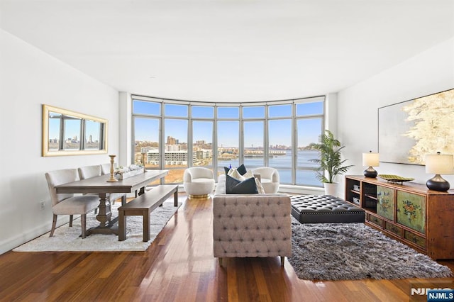 8100 River Rd Unit 1013, North Bergen, NJ 07047 - living area with expansive windows and wood-type flooring
