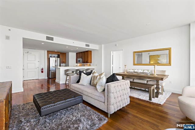 8100 River Rd Unit 1013, North Bergen, NJ 07047 - living room with dark wood-type flooring, baseboards, and recessed lighting