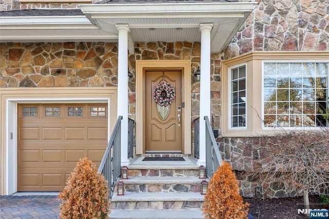 view of exterior entry with stone siding