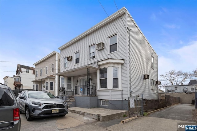 23 Foundry St, Newark, NJ 07105 - townhome / multi-family property featuring fence and a wall unit AC