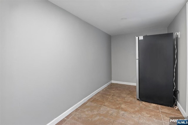 23 Foundry St, Newark, NJ 07105 - spare room with stone finish flooring and baseboards