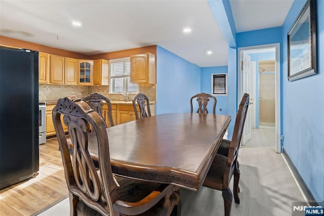23 Foundry St, Newark, NJ 07105 - dining room with baseboards, light wood finished floors, and recessed lighting