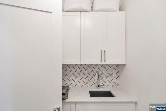 laundry area featuring a sink