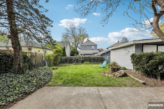 view of yard featuring fence