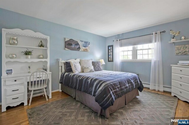 bedroom with baseboard heating