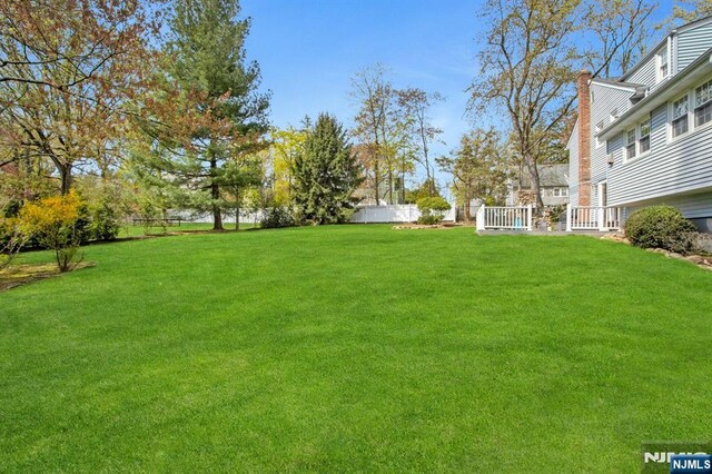 view of yard with fence