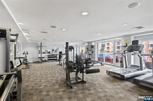 gym featuring carpet flooring and recessed lighting