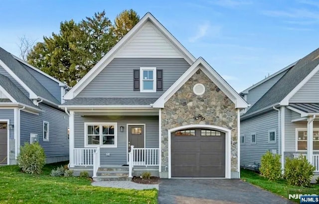 5 Banks Dr, Boonton Town, NJ 07005 - craftsman inspired home featuring a front lawn, aphalt driveway, and stone siding