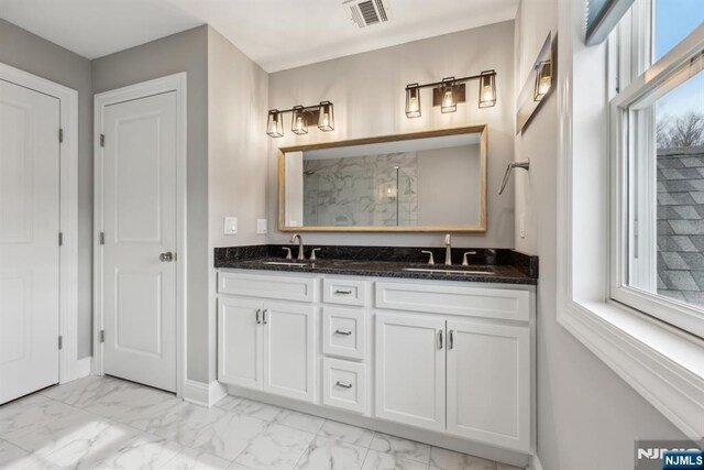 5 Banks Dr, Boonton Town, NJ 07005 - full bath with marble finish floor, a sink, visible vents, and a walk in shower
