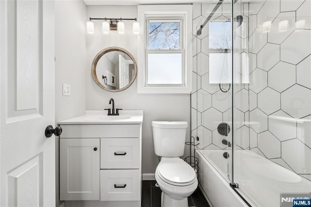 full bathroom with shower / washtub combination, toilet, and vanity