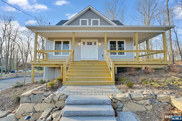 305 Mountainside Dr, Vernon, NJ 07422 - view of front facade featuring a porch and stairs