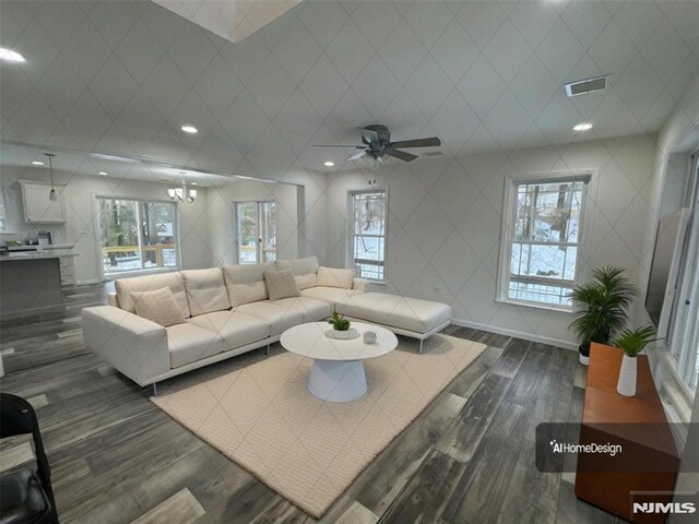 305 Mountainside Dr, Vernon, NJ 07422 - living area with dark wood-style floors, healthy amount of natural light, and ceiling fan