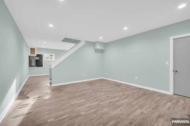 305 Mountainside Dr, Vernon, NJ 07422 - unfurnished living room with wood finished floors, baseboards, recessed lighting, and stairs