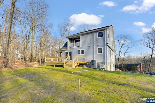 305 Mountainside Dr, Vernon, NJ 07422 - rear view of property featuring a balcony, a lawn, ac unit, and a deck
