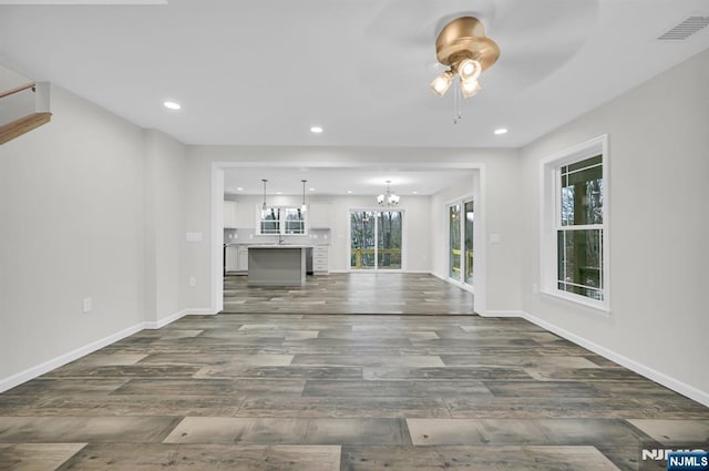 305 Mountainside Dr, Vernon, NJ 07422 - unfurnished living room with dark wood-style flooring, a ceiling fan, baseboards, and recessed lighting